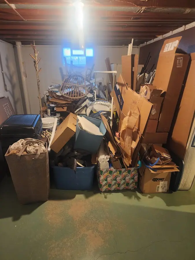 Roll-off dumpster container at job site for 6 Yard Dumpster Rental in Nowthen